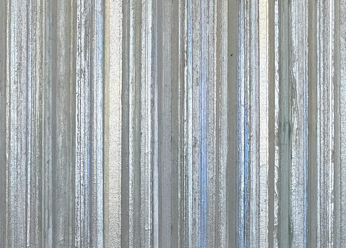 Detail of iridescent pigments and acrylic medium on a cradled board