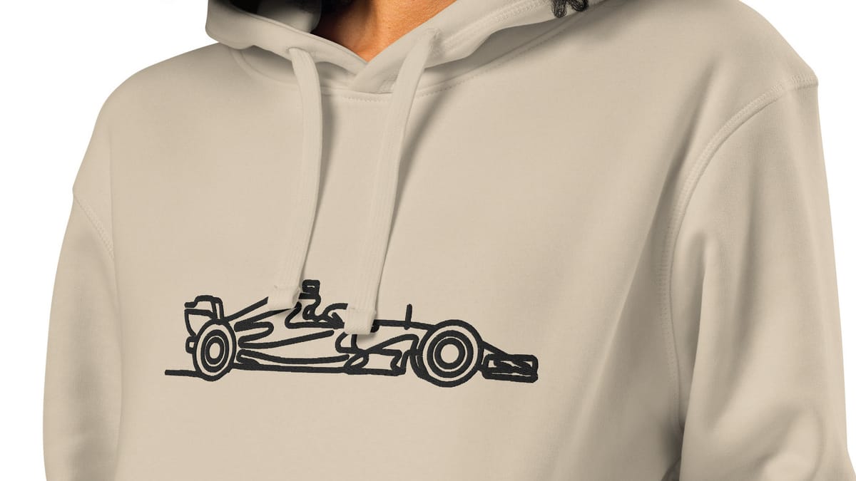 A beige hoodie with a single-line embroidered race car on the chest.