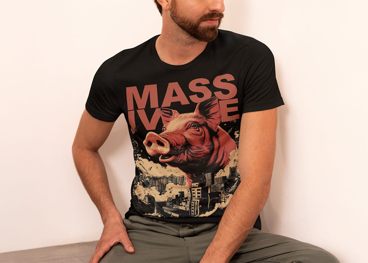 A man wearing the FUKKT Massive Pig T-shirt in black