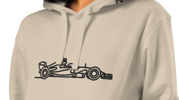 A beige hoodie with a single-line embroidered race car on the chest.